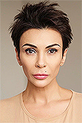 model Nizhinskaya Gulnara   
Year of birth 1976   
Height: 162   
Eyes color: brown   
Hair color: light brown